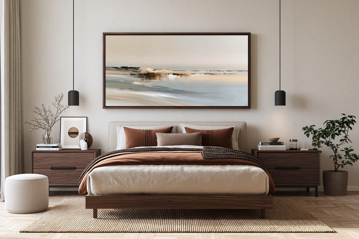 a modern bedroom with a large bed, wooden nightstands, and a large painting hanging above the bed. The room has a neutral color scheme with beige walls, a brown wooden floor, and a white ottoman. There are also two potted plants and a vase in the room, adding a touch of greenery and natural elements to the space.