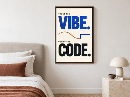 a bedroom setting with a framed poster on the wall that reads "Trust the Vibe. Verify the Code."