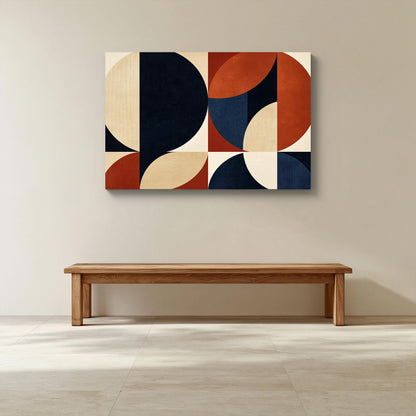 Mid century geometric abstract canvas wall art, wooden bench against a white wall, with a large abstract geometric painting