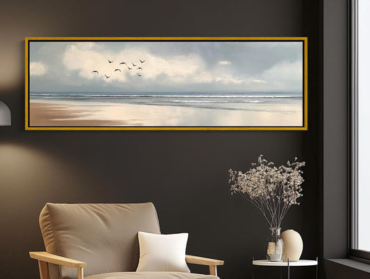 Panoramic beach canvas wall art, birds in flight over a calm shoreline under soft clouds