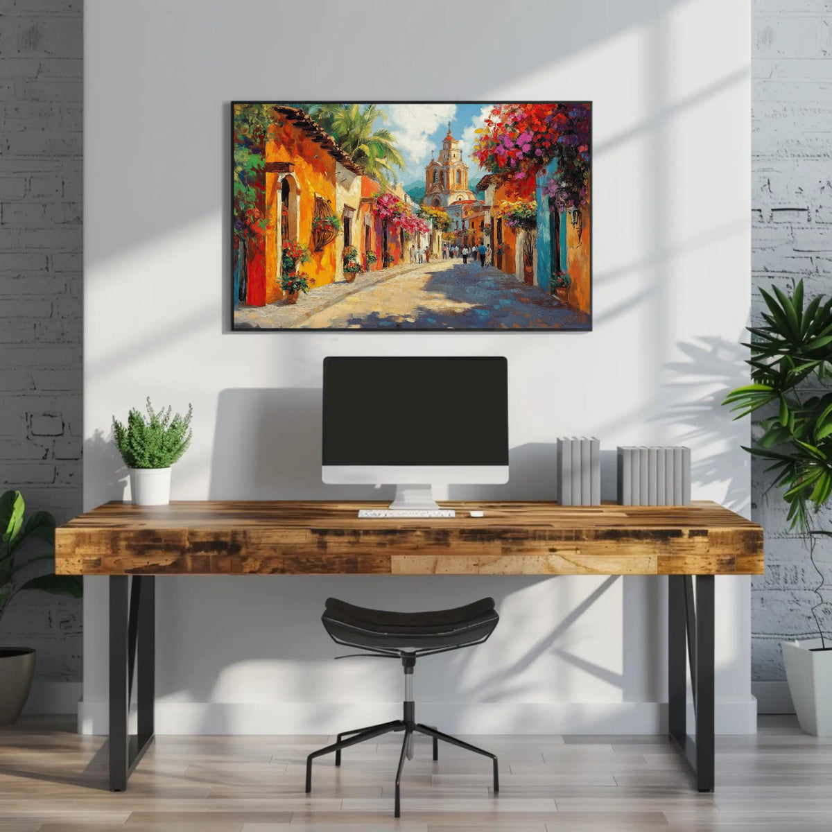 Colorful Mexican street canvas wall art, modern workspace with a wooden desk, a computer monitor, and a chair. Above the