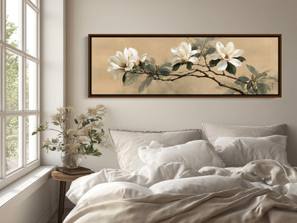 a serene bedroom scene with a large floral painting hanging on the wall above a bed with white bedding.