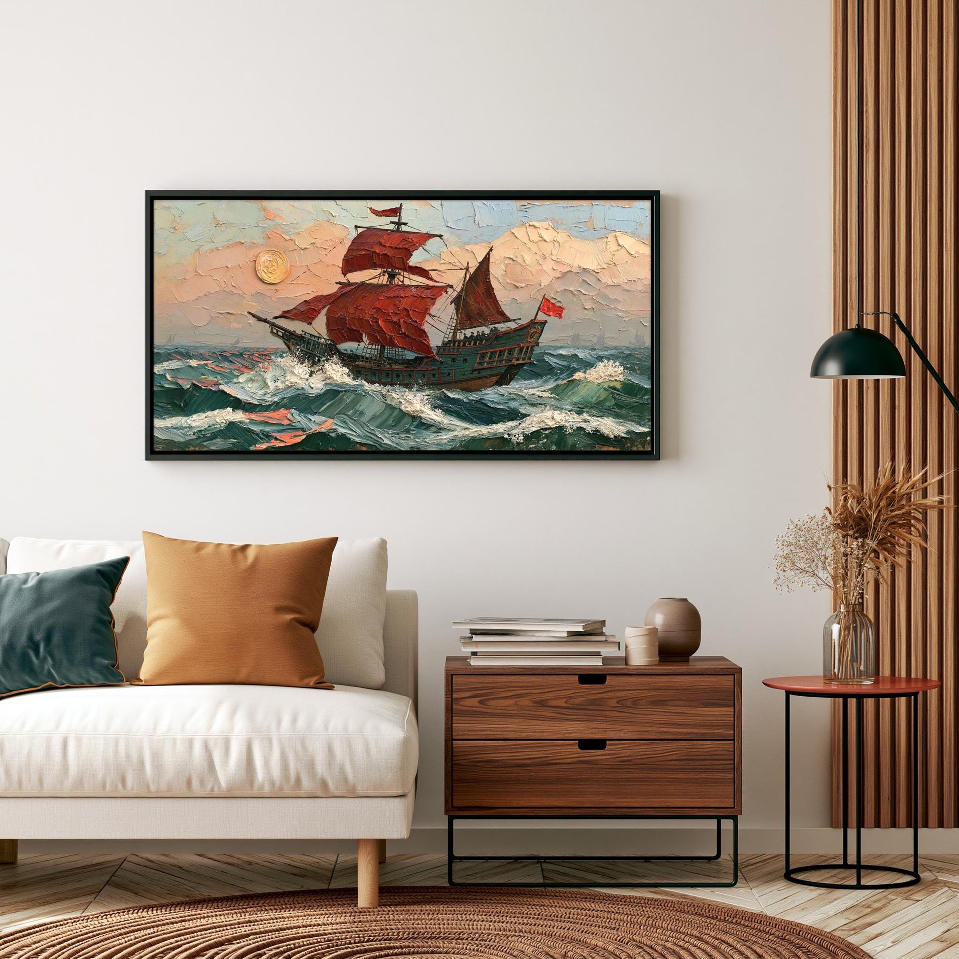 a large painting of a sailing ship on a stormy sea, hanging on a wall above a white sofa and a wooden side table.