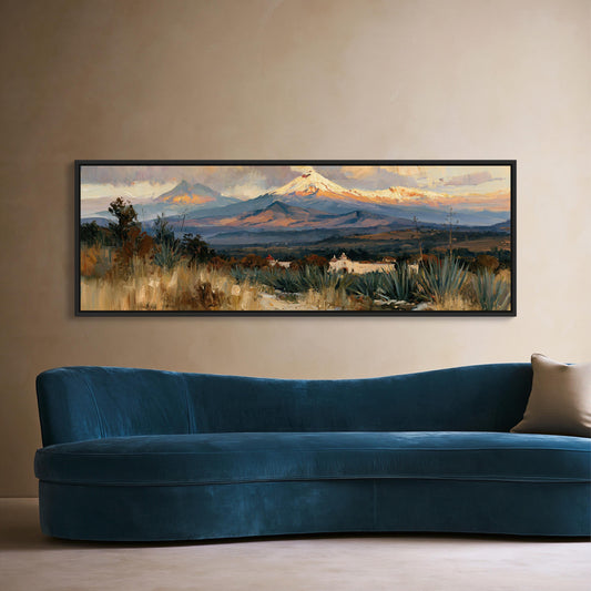 Mexican volcano and agave canvas wall art, large landscape painting hanging on a wall above a blue velvet sofa