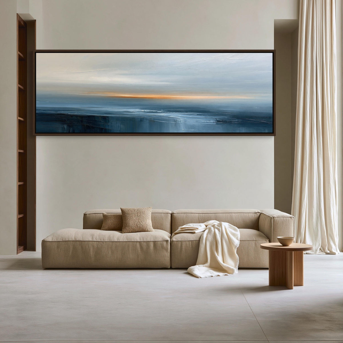 Navy orange abstract seascape canvas wall art, large, beige sectional sofa with a wooden coffee table in front of it, set