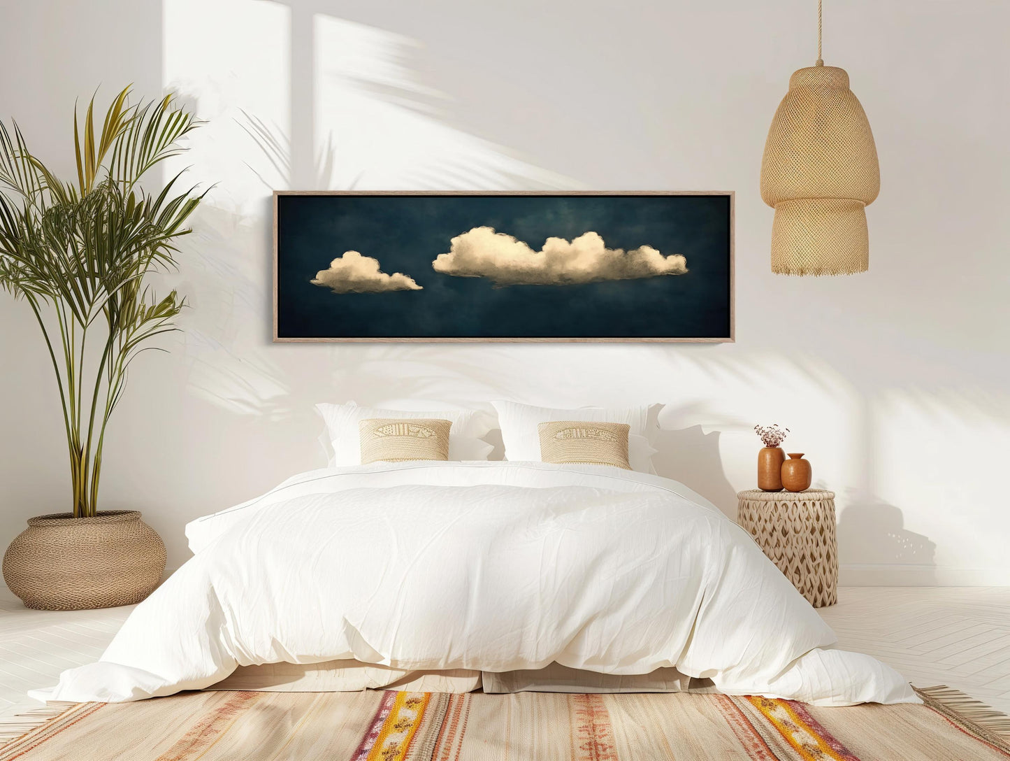 a bedroom with a large bed and a painting on the wall