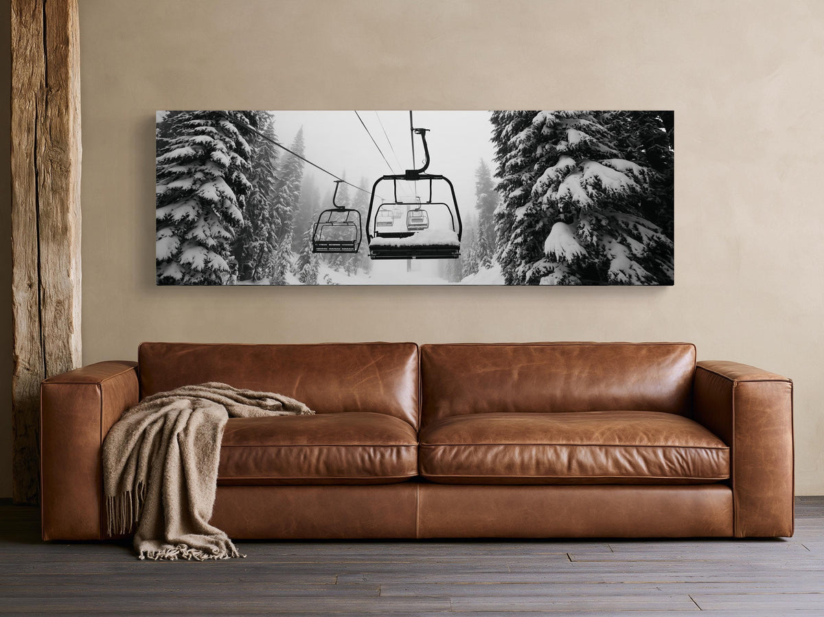 Ski chairlift panoramic canvas wall art, empty chairlifts between snowy pine trees in black and white
