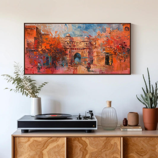 a painting on a wall above a record player