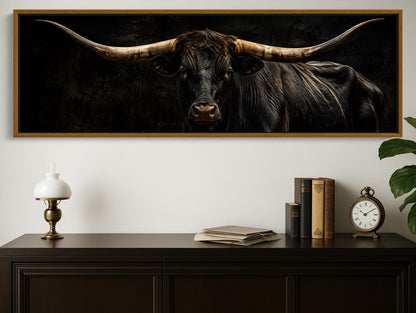 Texas longhorn portrait canvas wall art, large framed picture of a bull with long horns, displayed on a wall above a wooden