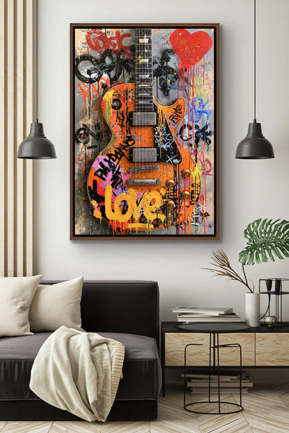 a modern living room with a large, colorful, graffiti-style guitar painting hanging on the wall above a black couch. The painting is surrounded by various graffiti-style elements, creating a vibrant and artistic atmosphere.