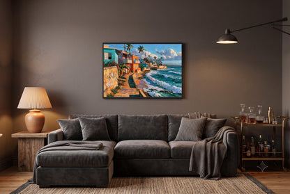 La Perla seaside lane canvas wall art, living room with a gray sectional sofa, a wooden side table with a lamp, and a framed