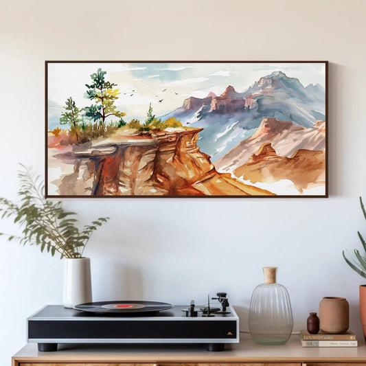 a painting hanging on a wall above a table