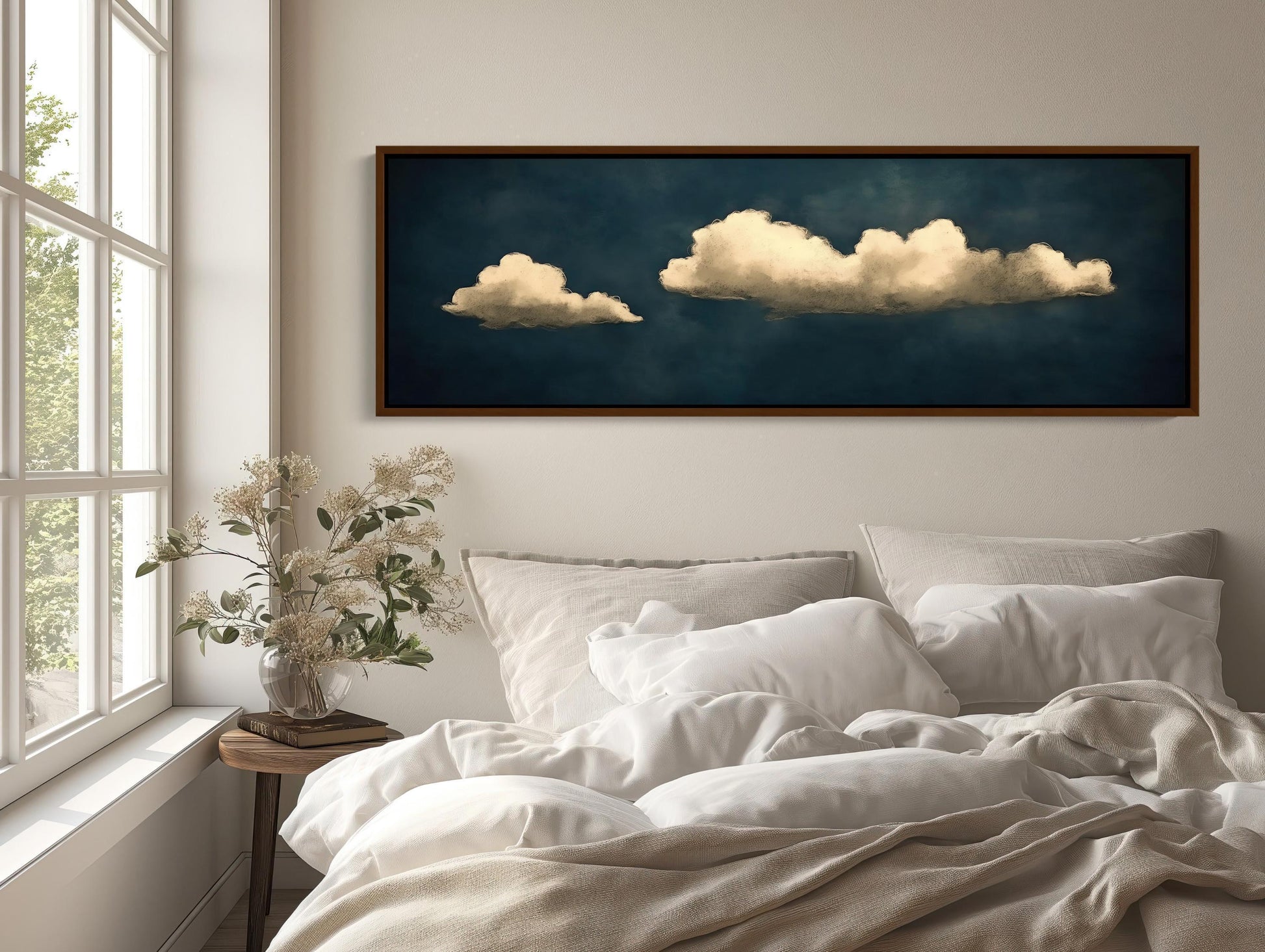a bedroom with a bed and a painting on the wall