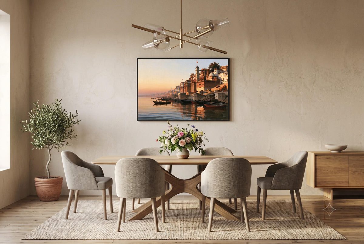 a modern dining room with a large wooden table surrounded by six upholstered chairs. Above the table, there is a framed picture of a cityscape with a river and boats. The room has a neutral color scheme with beige walls and a wooden floor, and there is a potted plant and a vase of flowers on the table.