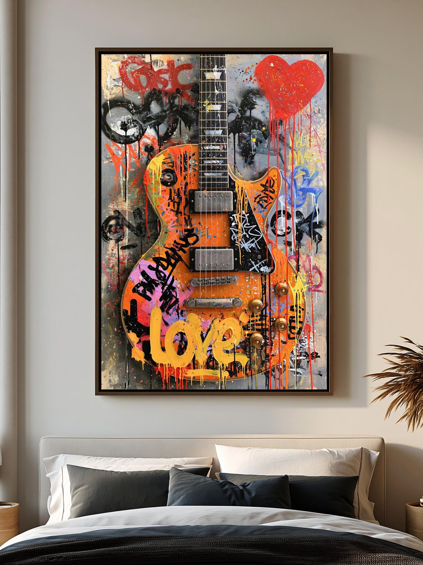 a large, colorful, graffiti-style electric guitar hanging on a wall above a bed.