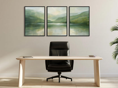 Misty sage lake triptych canvas wall art, modern office setup with a wooden desk, a black leather office chair, and three