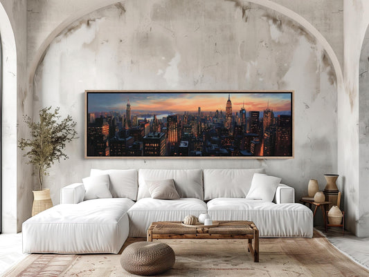 a living room with a white couch and a painting on the wall