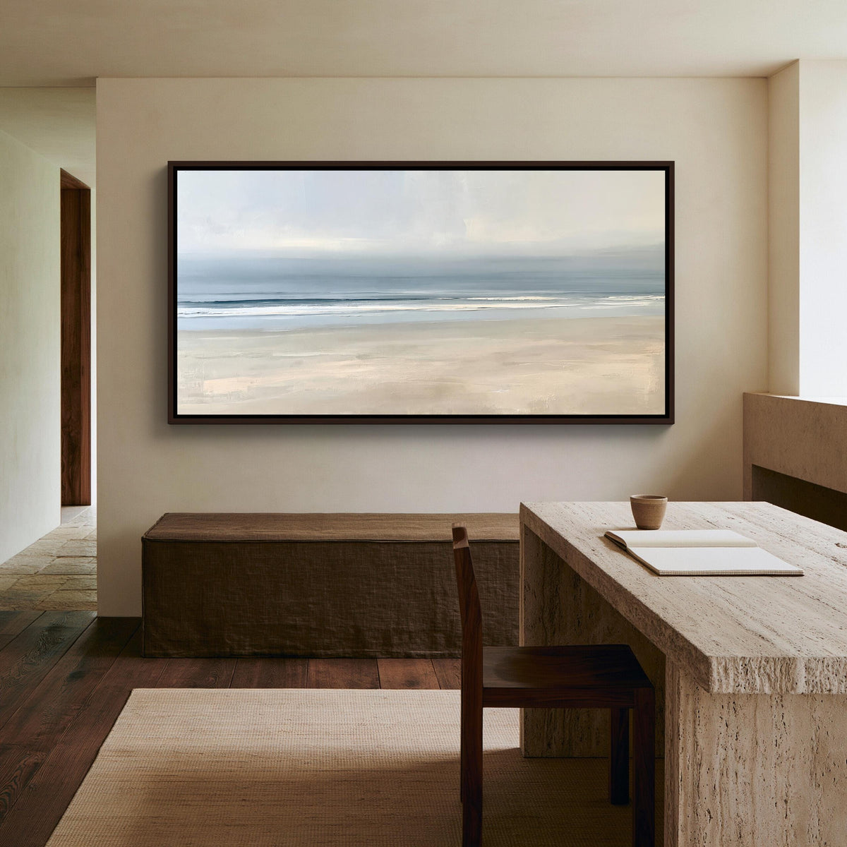 Calm minimalist beach canvas wall art, serene indoor setting with a large painting of a beach scene hanging on the wall