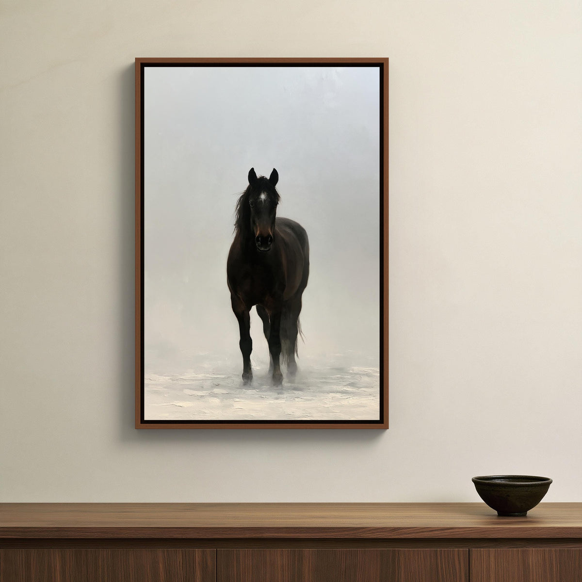 Black horse in mist canvas wall art, black horse standing in a snowy field, with a wooden cabinet below it