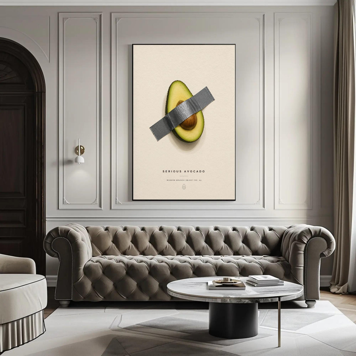 Taped avocado canvas wall art, modern living room with a tufted gray sofa, a round coffee table, and a large framed artwork