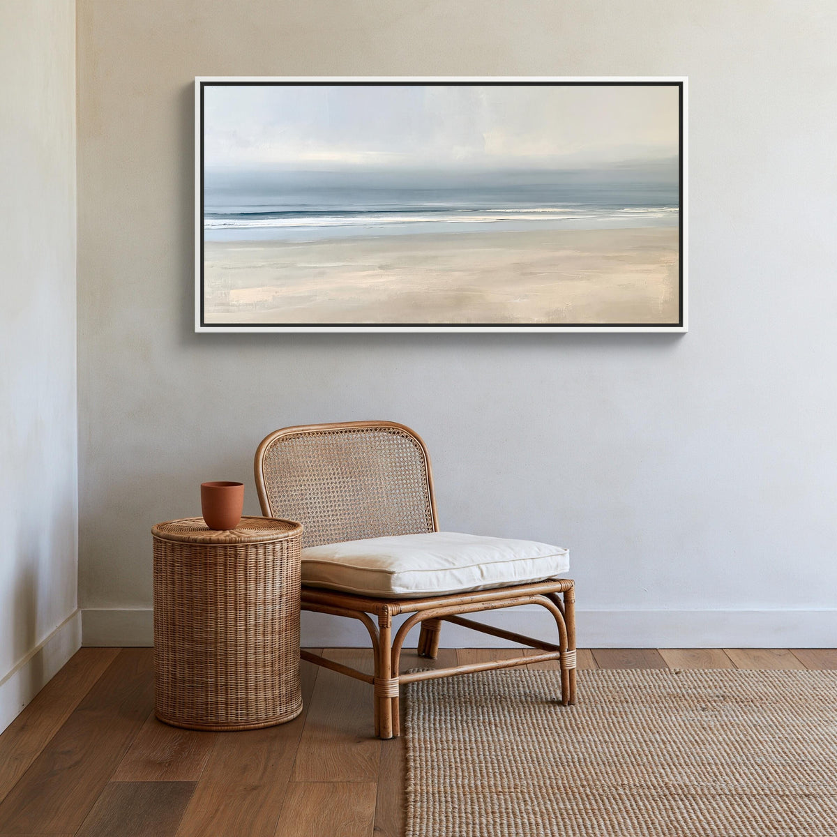 Calm minimalist beach canvas wall art, serene beach scene with a wicker chair and a woven side table, both situated in a