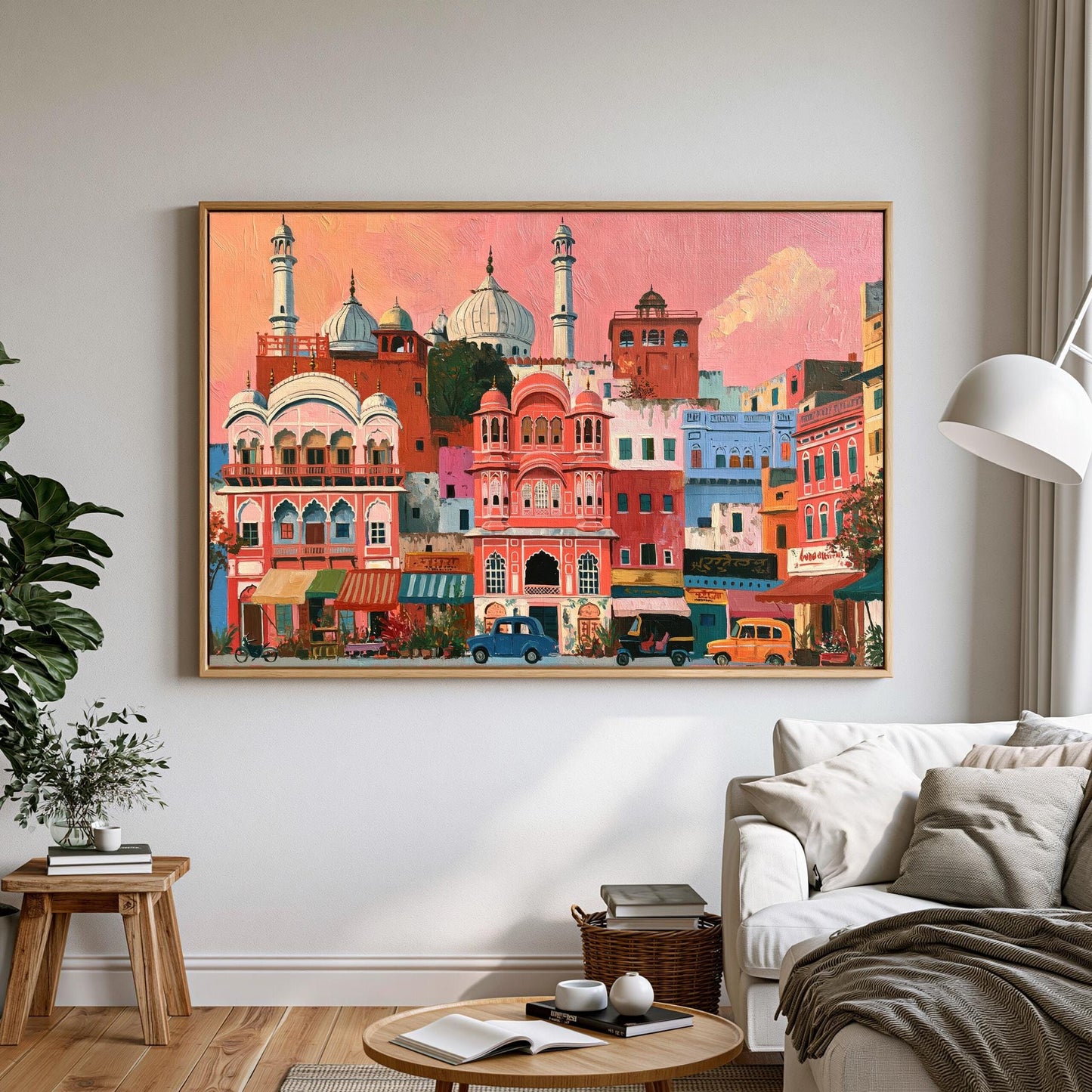 a large, colorful painting of a cityscape hanging on a wall in a living room.
