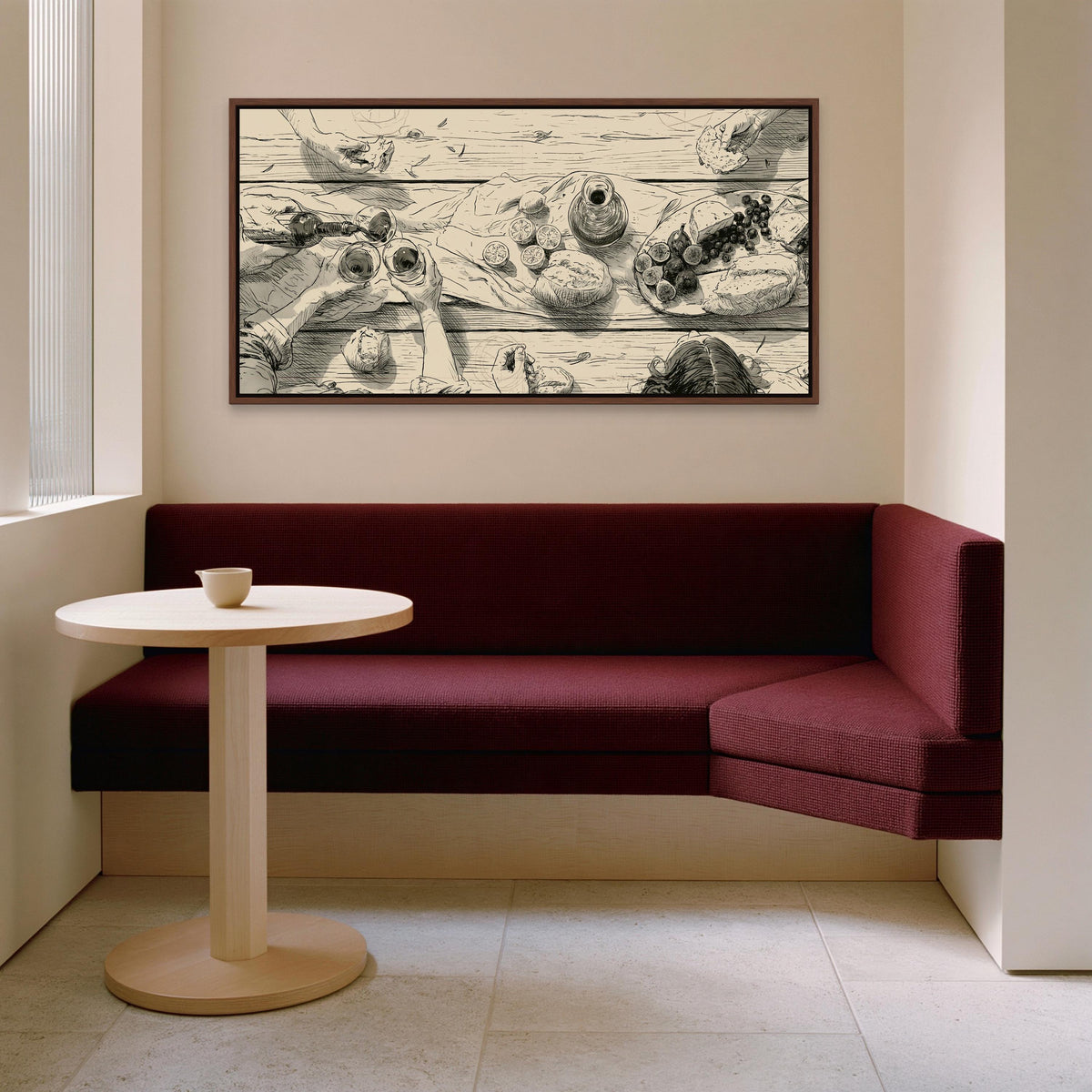 Dinner party table sketch canvas wall art, cozy living room with a red sofa, a round wooden table, and a framed black and