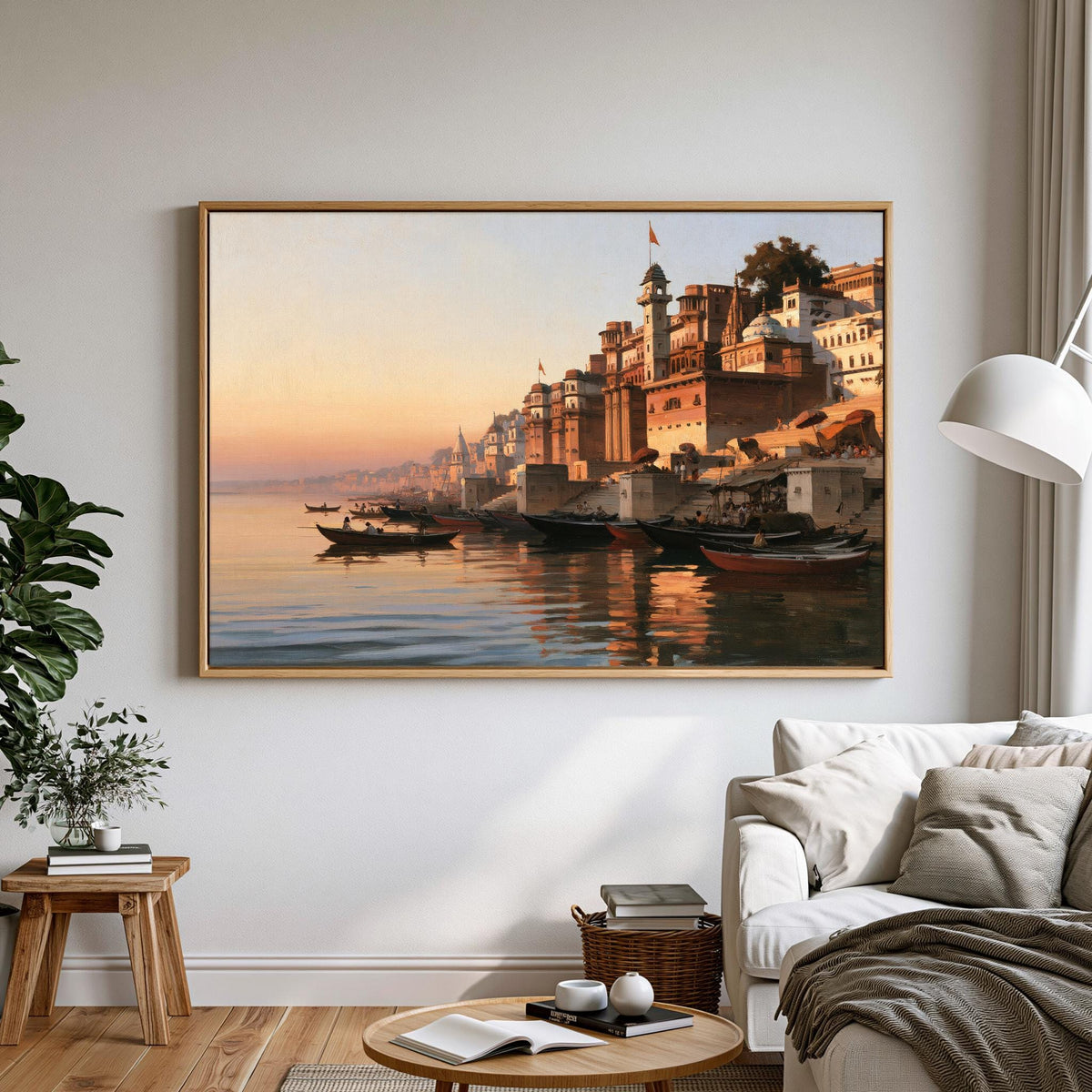 a large painting of a cityscape with boats on the water, hanging on a wall in a living room setting.