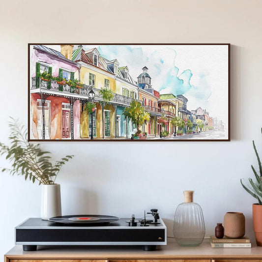 a painting hanging on a wall above a table