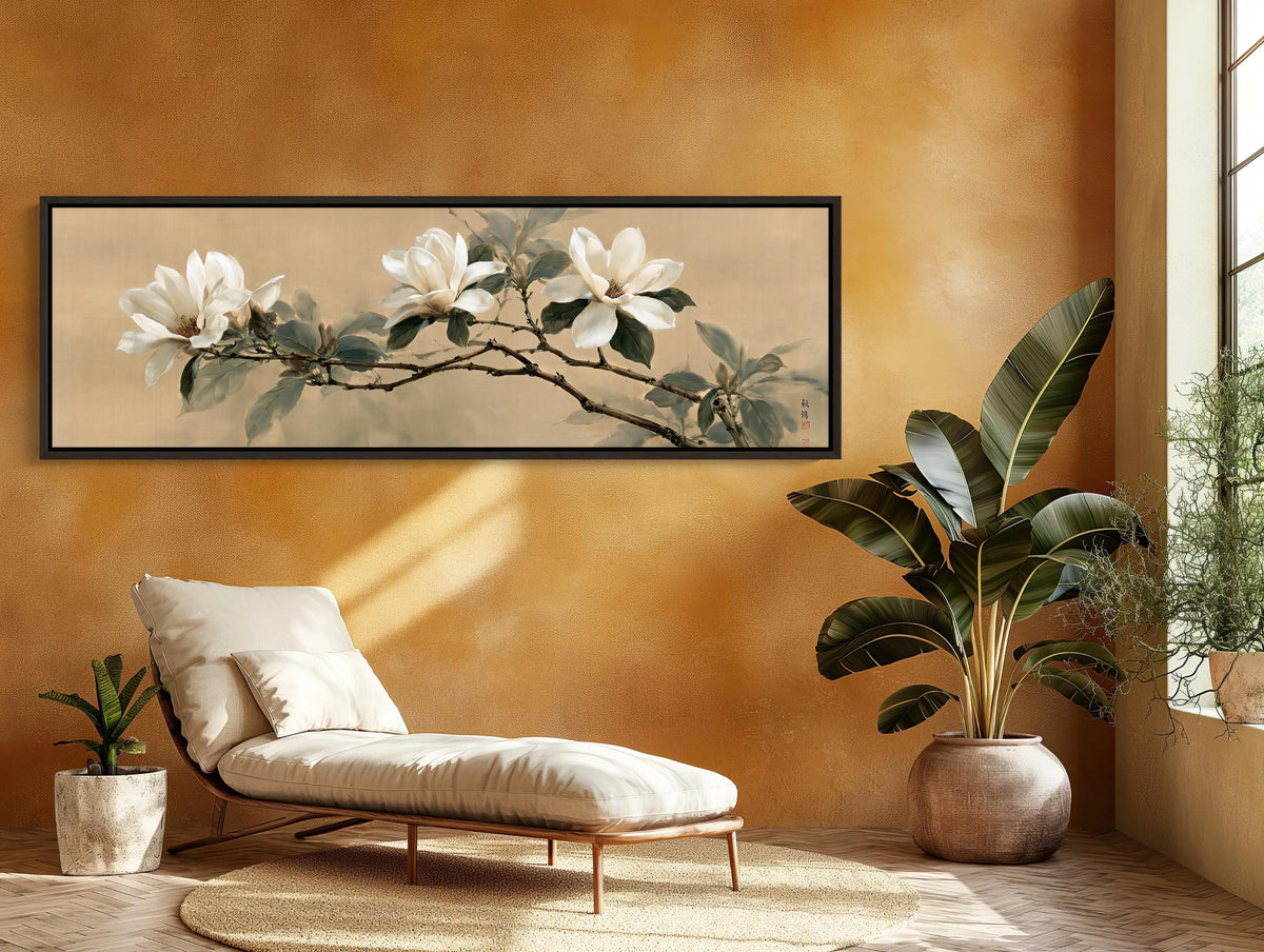 a serene and cozy living room with a large window, a comfortable lounge chair, and a potted plant. The walls are painted a warm orange color, and a framed painting of white flowers is displayed above the chair.