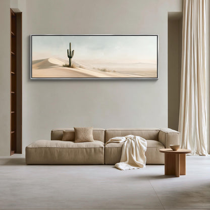 Lone saguaro on sand dunes canvas wall art, large, beige sectional sofa with a wooden coffee table in front of it, set