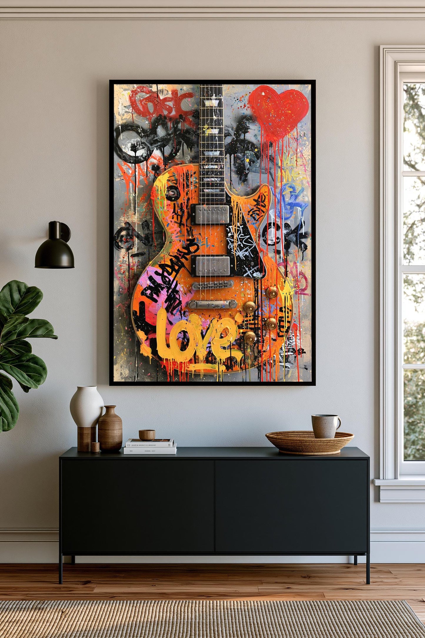 a vibrant, graffiti-style painting of a guitar hanging on a wall above a black console table.