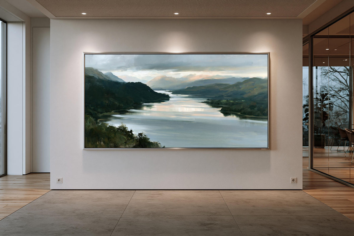 a large, framed painting of a serene landscape depicting a river surrounded by mountains and lush greenery.