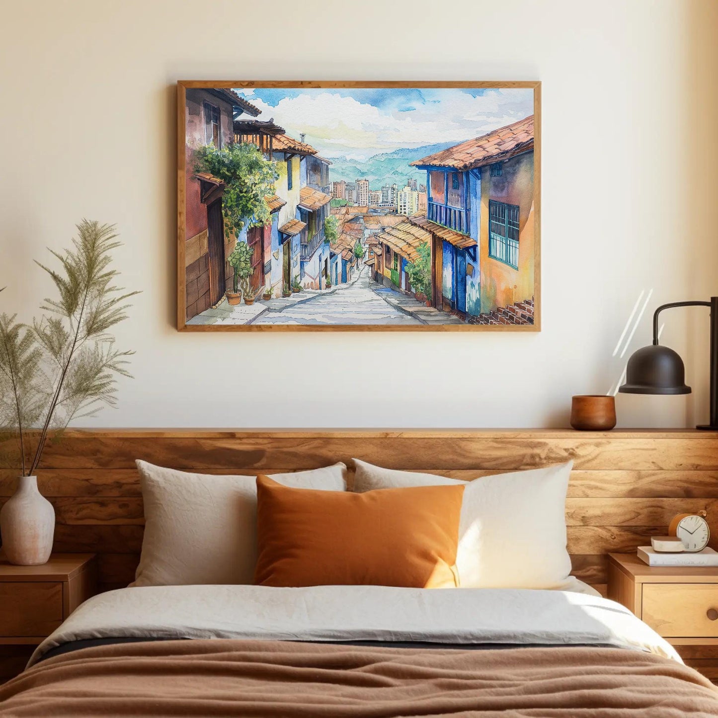 Medellín Watercolor Painting canvas wall art shown above a bed