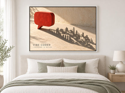 a large framed artwork depicting a cityscape with a red speech bubble in the foreground, hanging above a bed with white pillows and a gray blanket.
