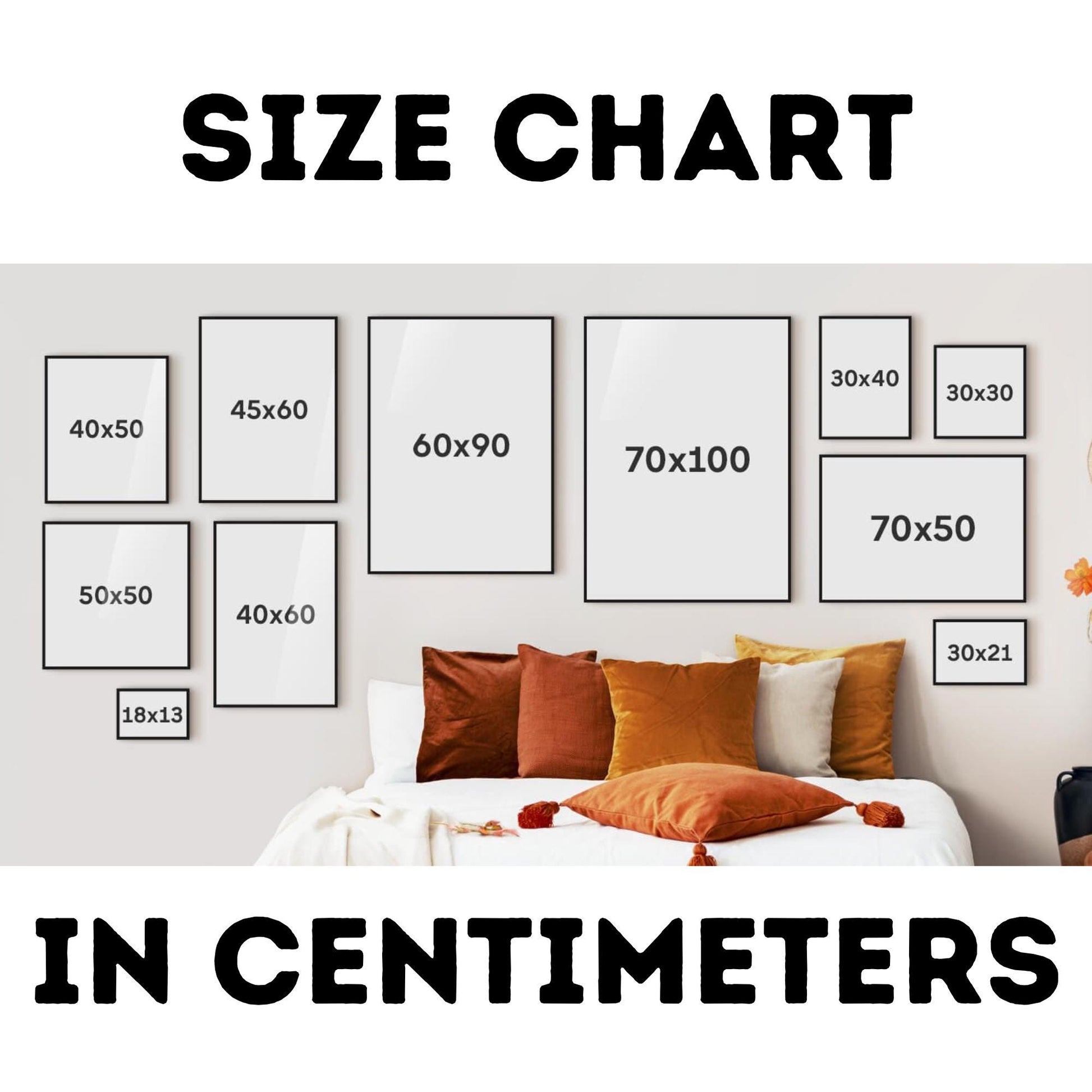 a bedroom with a bed, pillows, and pictures on the wall