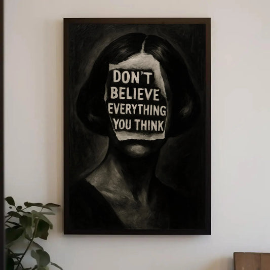 Inspirational surreal face canvas wall art print for mental health decor or gothic office with don’t believe everything you think quote Wall Art – Canvas Print
