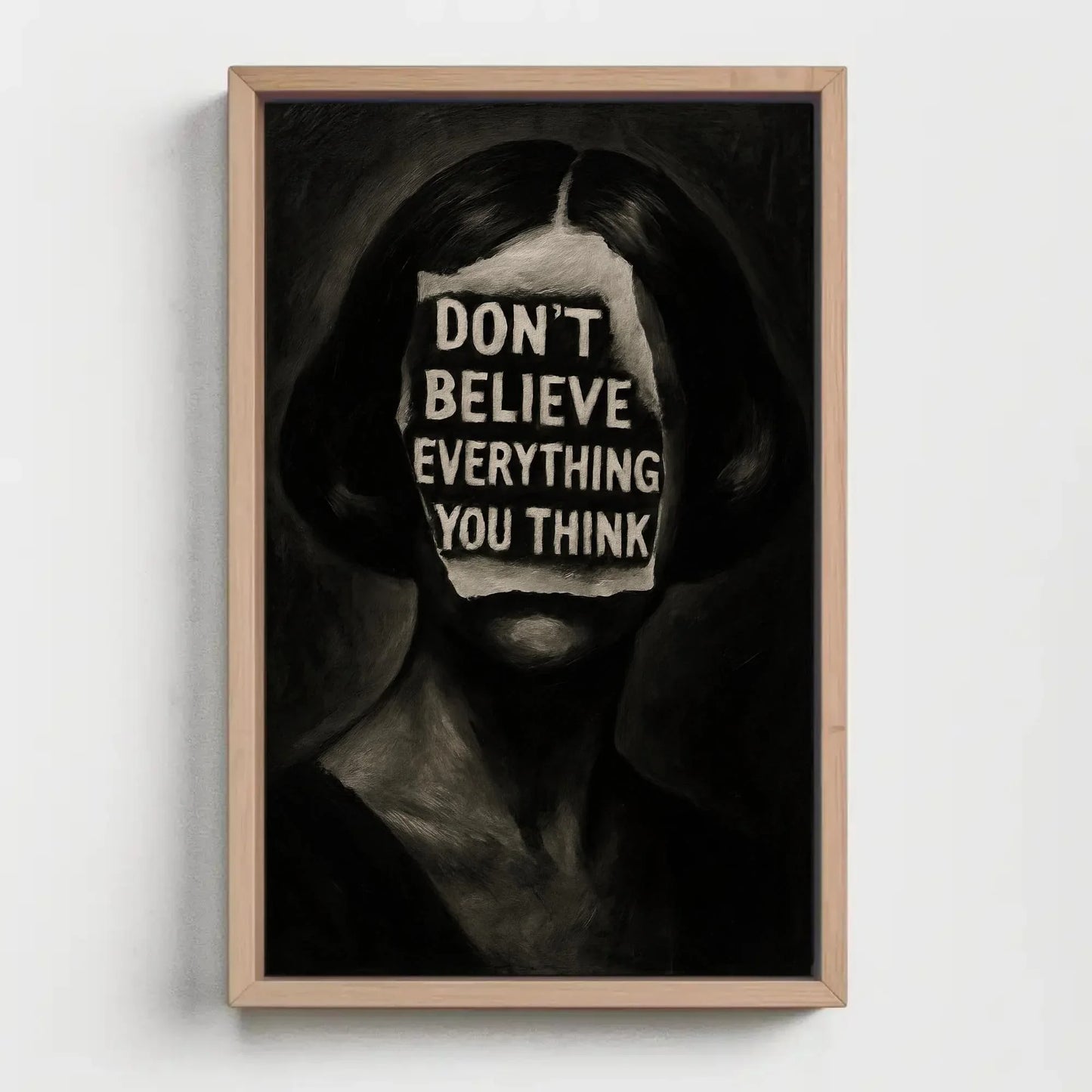 Inspirational surreal face canvas wall art print for mental health decor or gothic office with don’t believe everything you think quote Wall Art – Canvas Print