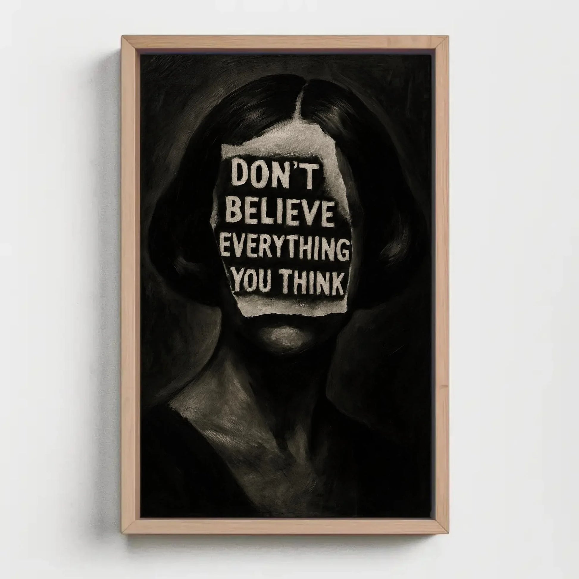 Inspirational surreal face canvas wall art print for mental health decor or gothic office with don’t believe everything you think quote Wall Art – Canvas Print